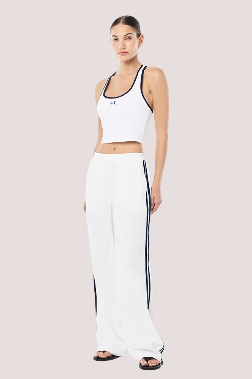 Relay spray track pant | White/Dark Navy