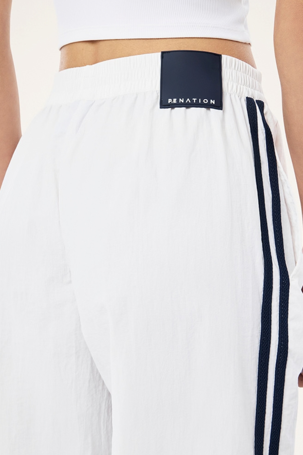 Relay spray track pant | White/Dark Navy